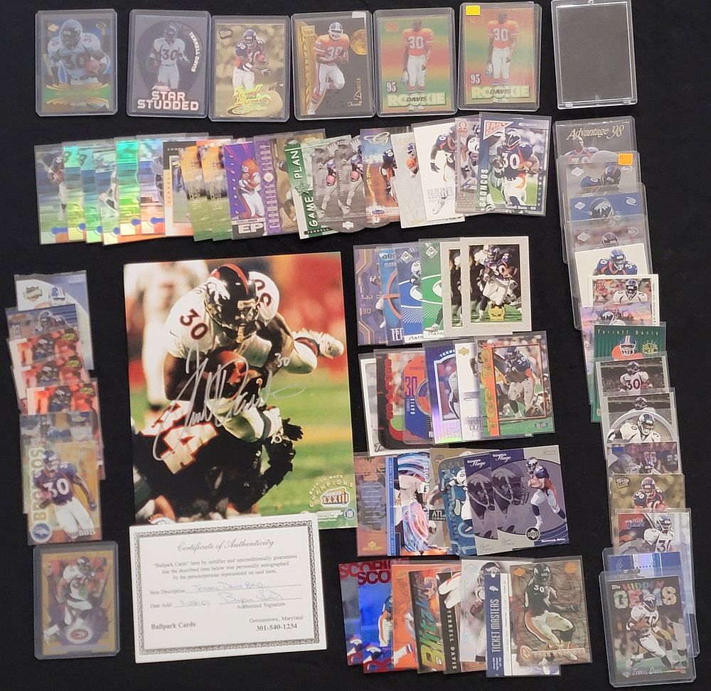 Lot 409: Terrell Davis Denver Broncos Trading Cards and Autographed Photograph