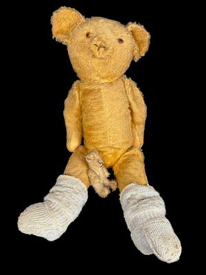 Two Vintage Mohair Teddy Bears with Hand-Knitted Booties - Steiff. This lot features a vintage 