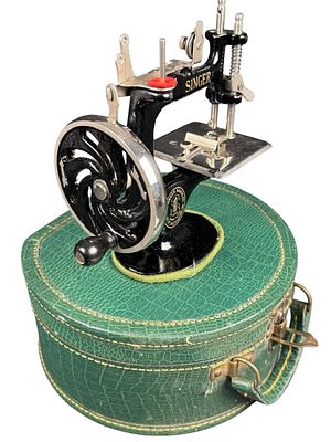 Singer Model No. 20 Child's Toy Sewing Machine Set with Carrying Case. This is a Singer Model 