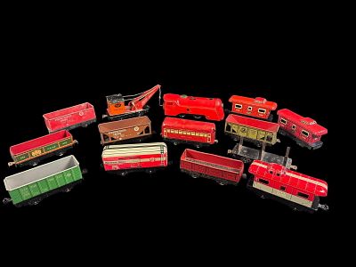 Thirteen Louis Marx and Company O-Gauge Toy Train Pieces including Commodore Vanderbilt Locomotive. 