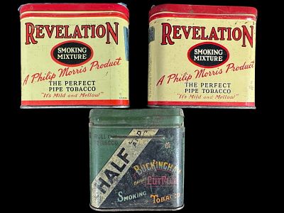 A Trio of Vintage Lithographed Metal Pocket Tobacco Tins Including Revelation and Half and Half. 