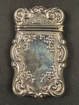Victorian era Sterling Match safe. Highly decorative floral design. Marked sterling.