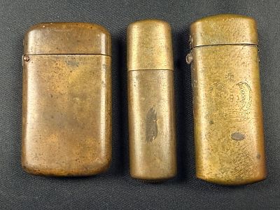A Trio of World War I Era Brass Match Safes and Souvenir Container. A group of three brass 