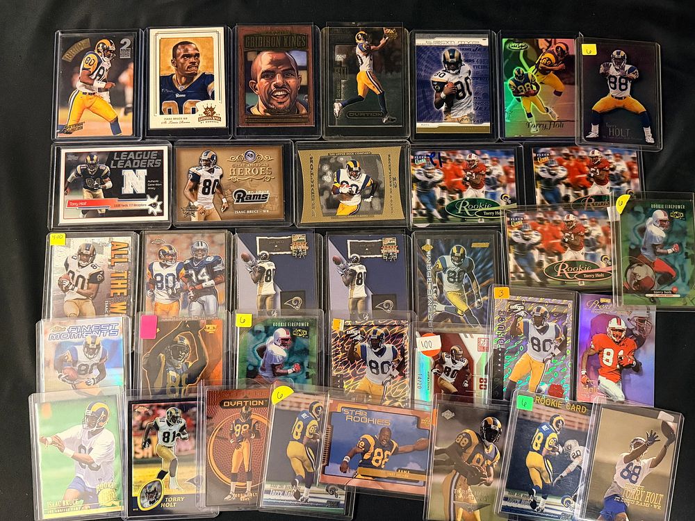 Lot 112: 34 Torry Holt and Isaac Bruce St. Louis Rams Football Trading Cards Including Rookie Cards and