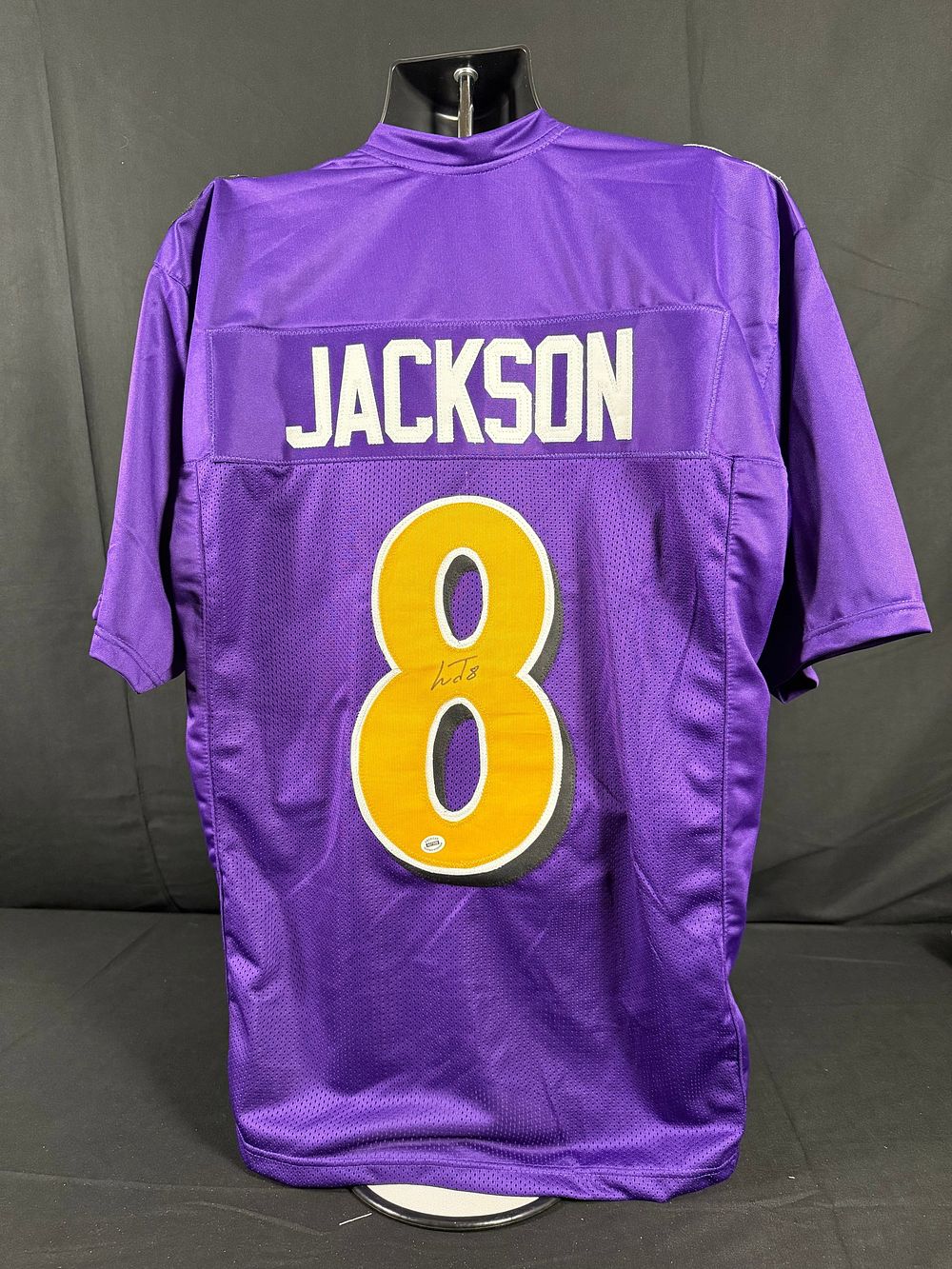 Lot 32: Lemar Jackson Signed Baltimore Ravens Jersey