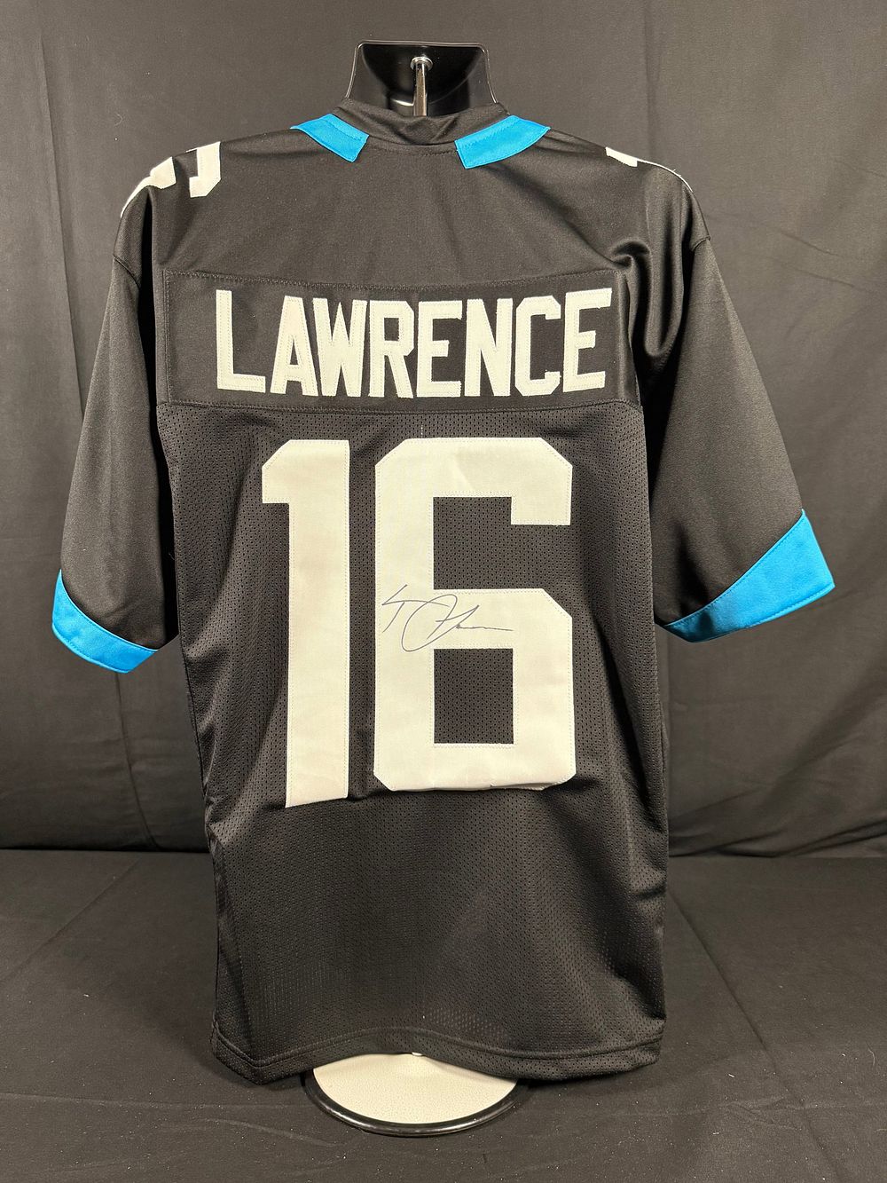 Lot 38: Trevor Lawrence Signed Jacksonville Jaguars Alternate Jersey
