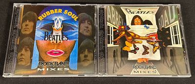 The Beatles - Rock Band Mixes Collection (2 CDs). Pair of Beatles collector CDs derived from the 