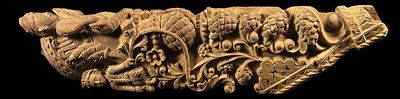 Southeast Asian Wooden Carving. Hand-carved wooden piece of Southeast Asian origin, decorated in 