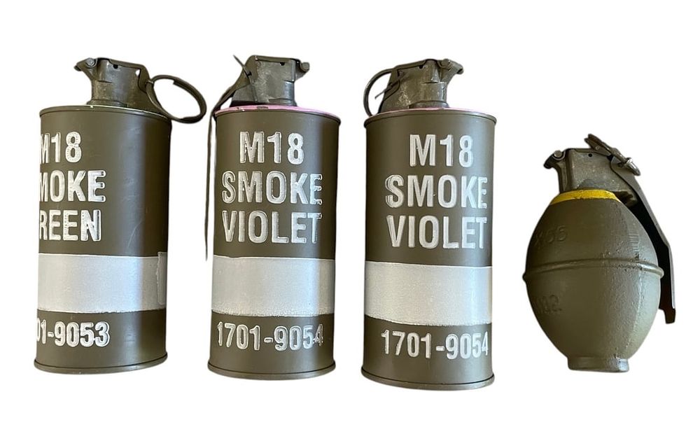 Lot 127: Group of Four U.S. Smoke / Fragmentation-Style M18 and M26