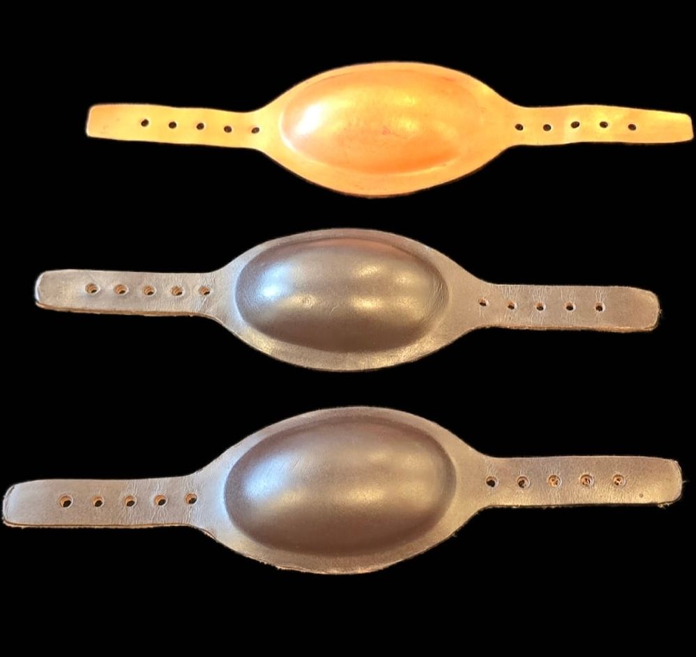 Lot 174: WWII Airborne M1C/M2 Leather Chin Cups, Lot of 3