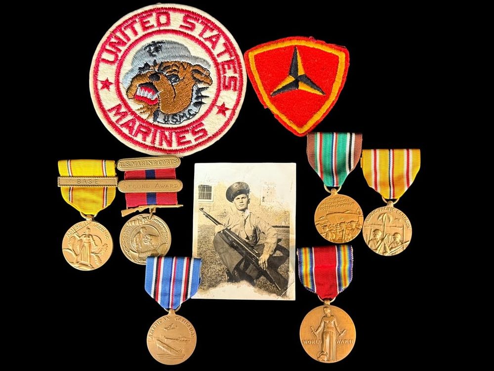Lot 222: Named WWII USMC Good Conduct group