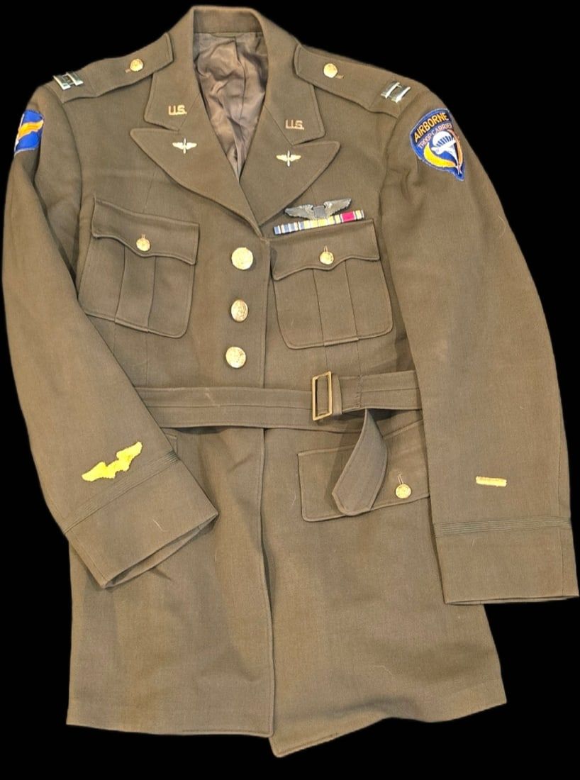 Lot 296: Named WWII 11th AAF & Troop Carrier Pilot Tunic