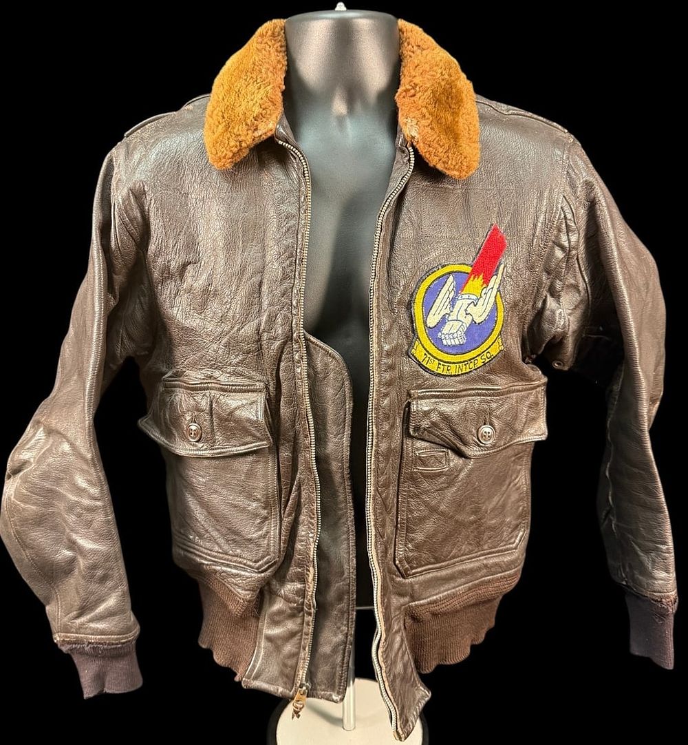 Lot 327: L.W. Foster G-1 Flight Jacket, 71st FIS Patch