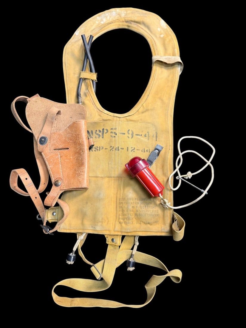 Lot 355: WWII USAAF B-4 Mae West, M3 Holster & Signal
