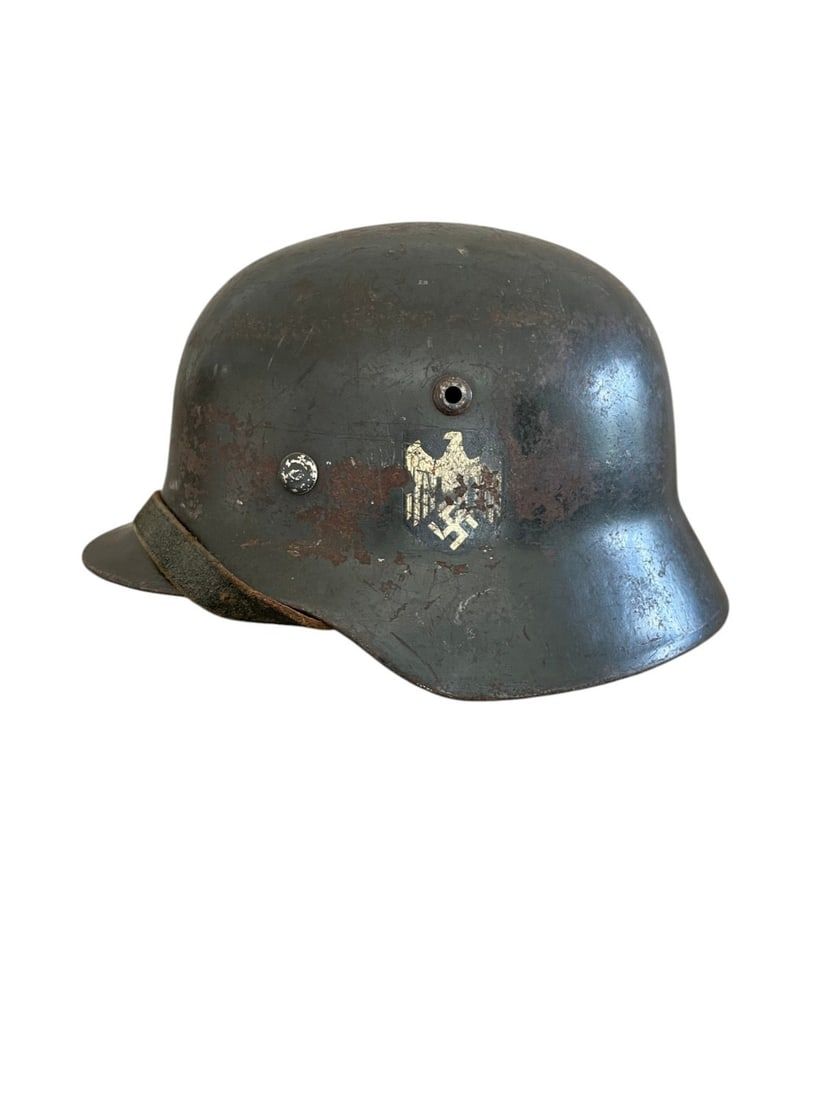 Lot 453: Rare WWII M35 Double Decal Army - Heer Helmet NS62