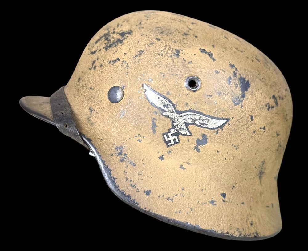 Lot 465: WWII German Luftwaffe M35 Tropical Camo Helmet