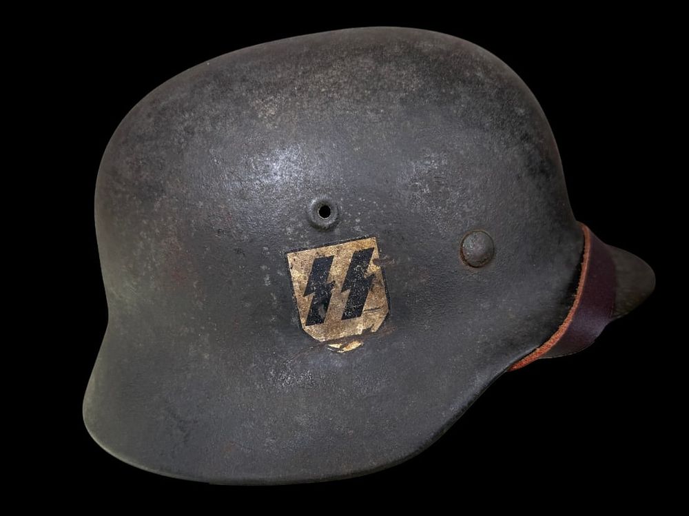 Lot 468: WWII Waffen-SS M40 EF64 Combat Helmet