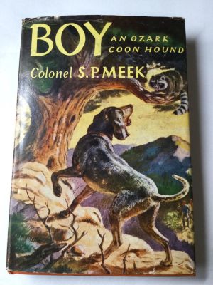 Boy an Ozark Coon Hound. Colonel S.P. Meek