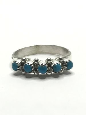 Zuni handmade ring. Sterling silver ring with turquoise stones. 3.87 grams total weight. Size 