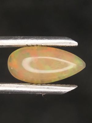 Opal gemstone. Cabochon cut Opal from Ethiopia. 1.65 carats total.