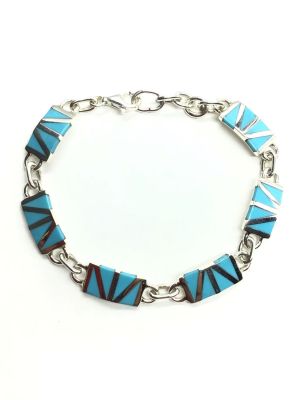 Zuni handmade bracelet. Sterling silver handmade Zuni bracelet featuring turquoise inlay. 13.14 