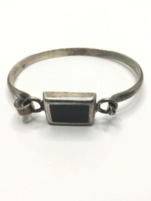 Artisan made bracelet. Sterling silver bracelet with onyx inlay. 21.22 grams total weight. Made 