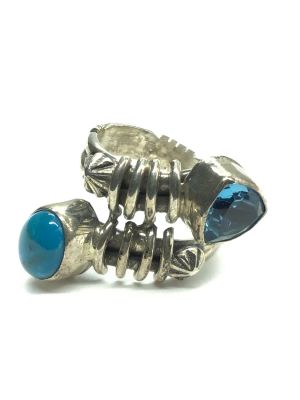 Navajo handmade ring. Sterling silver handmade ring featuring Kingman turquoise and blue topaz 