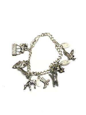 Sterling silver bracelet. Sterling bracelet with multiple Yellowstone Park dangles. 31.02 grams 