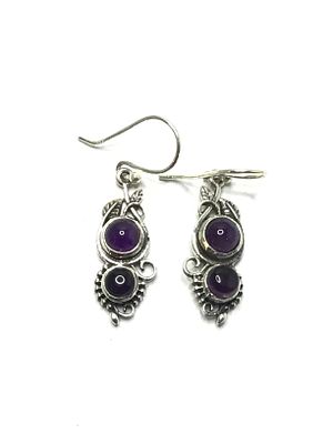 Sterling silver earrings. Sterling earrings with amethyst gemstones. 4.63 grams total weight.