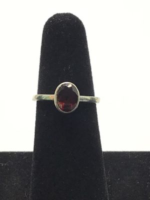 Sterling silver ring. Sterling ring with red garnet gemstone. 2.92 grams total weight. Size 8.