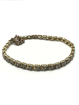 Sterling silver bracelet. Sterling bracelet with small rubies weighing 10.57 grams total. 7.5 