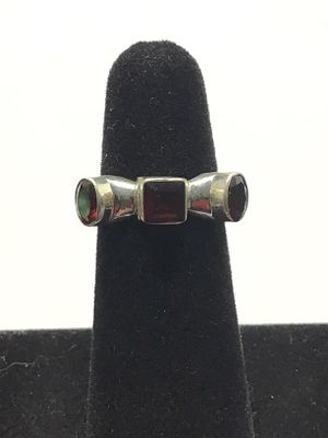Sterling silver earrings with red garnet gemstones. 6.03 grams total weight. Size 6
