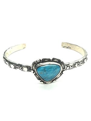 Artisan made cuff bracelet. Sterling silver cuff featuring turquoise stone. 22.58 grams of total 