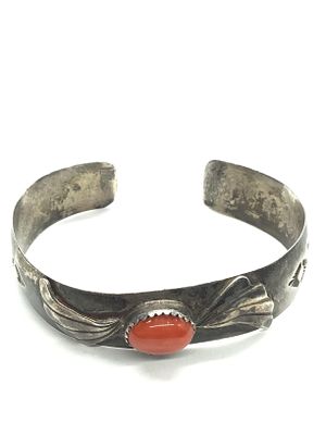 Artisan made cuff bracelet. Sterling silver cuff featuring red coral stone. 27.77 grams of total 