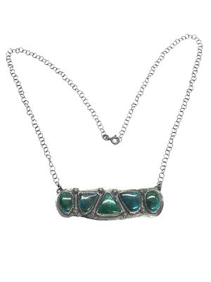 Artisan made necklace. Sterling silver necklace featuring turquoise stones. 15.10 grams of total 