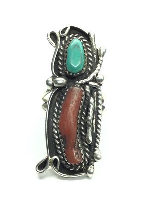 Navajo handmade ring. Sterling silver ring featuring turquoise and spiny stone. 9.24 grams of 