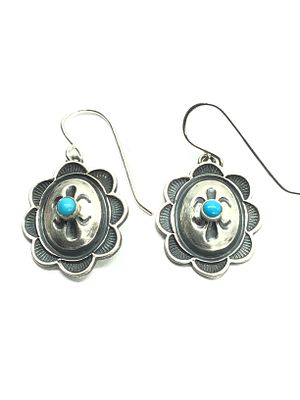 Artisan made earrings. Sterling silver earrings featuring turquoise stone. 5.50 grams of total 