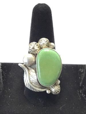 Navajo handmade ring. Sterling silver ring with turquoise stones. 17.22 grams total weight. Size 