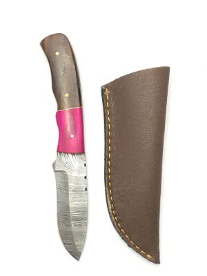 Damascus skinning knife with sheath. 3 3/4 inch blade.