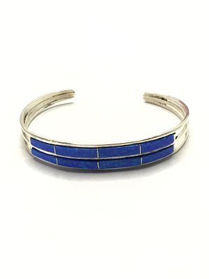 Navajo handmade cuff bracelet. Sterling silver cuff with opal inlay. 9.24 grams total weight. 