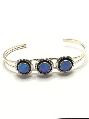 Navajo handmade cuff bracelet. Sterling silver cuff with opals. 12.62 grams total weight. Made 