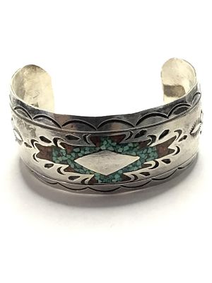 Artisan made cuff bracelet. Sterling silver cuff with crushed turquoise and red coral 