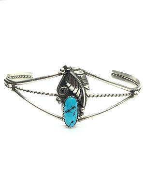 Artisan made cuff bracelet. Sterling silver cuff featuring turquoise stone. 11.31 grams of total 