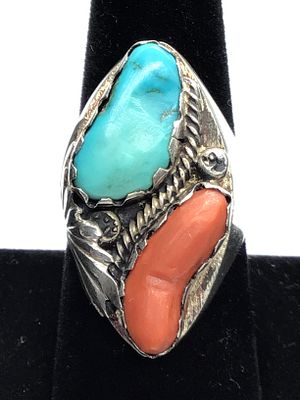 Navajo handmade ring. Sterling silver ring featuring turquoise and red coral. 23.74 grams of 