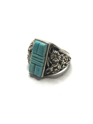 Artisan handmade ring. Sterling silver ring with turquoise inlay. 9.15 grams total weight. Size 