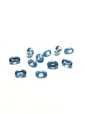 Blue topaz gemstones. Oval cut blue topazes. 10.75 carats total.