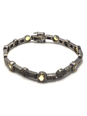 Sterling silver bracelet. Sterling bracelet with citrine gemstones. 18.59 grams total weight. 7 
