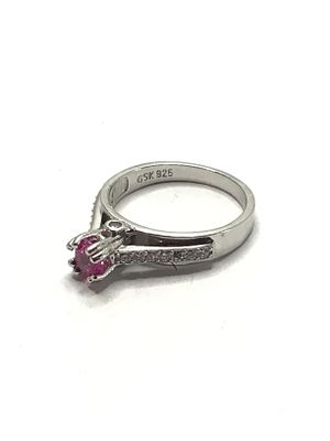 Sterling silver ring. Sterling ring with pink sapphire gemstone. 3.34 grams total weight. Size 7 1/2.