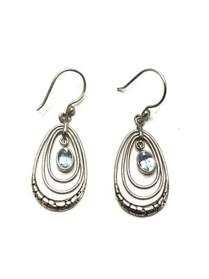 Sterling silver earrings. Sterling earrings with blue topaz gemstones. 6.31 grams total weight.