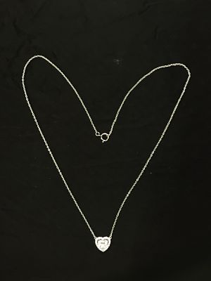 Sterling silver necklace and pendant. Sterling necklace with pendant featuring heart shaped CZ 